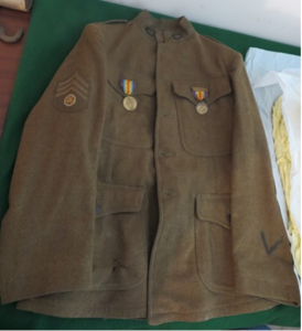Gervis Lemley’s service coat, with insignia on the right sleeve designating his position as a Motor Transport Sergeant. Image by Rick Kriebel, the Stone House Foundation.